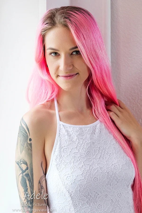 Pink hair girl Adele naked at the window